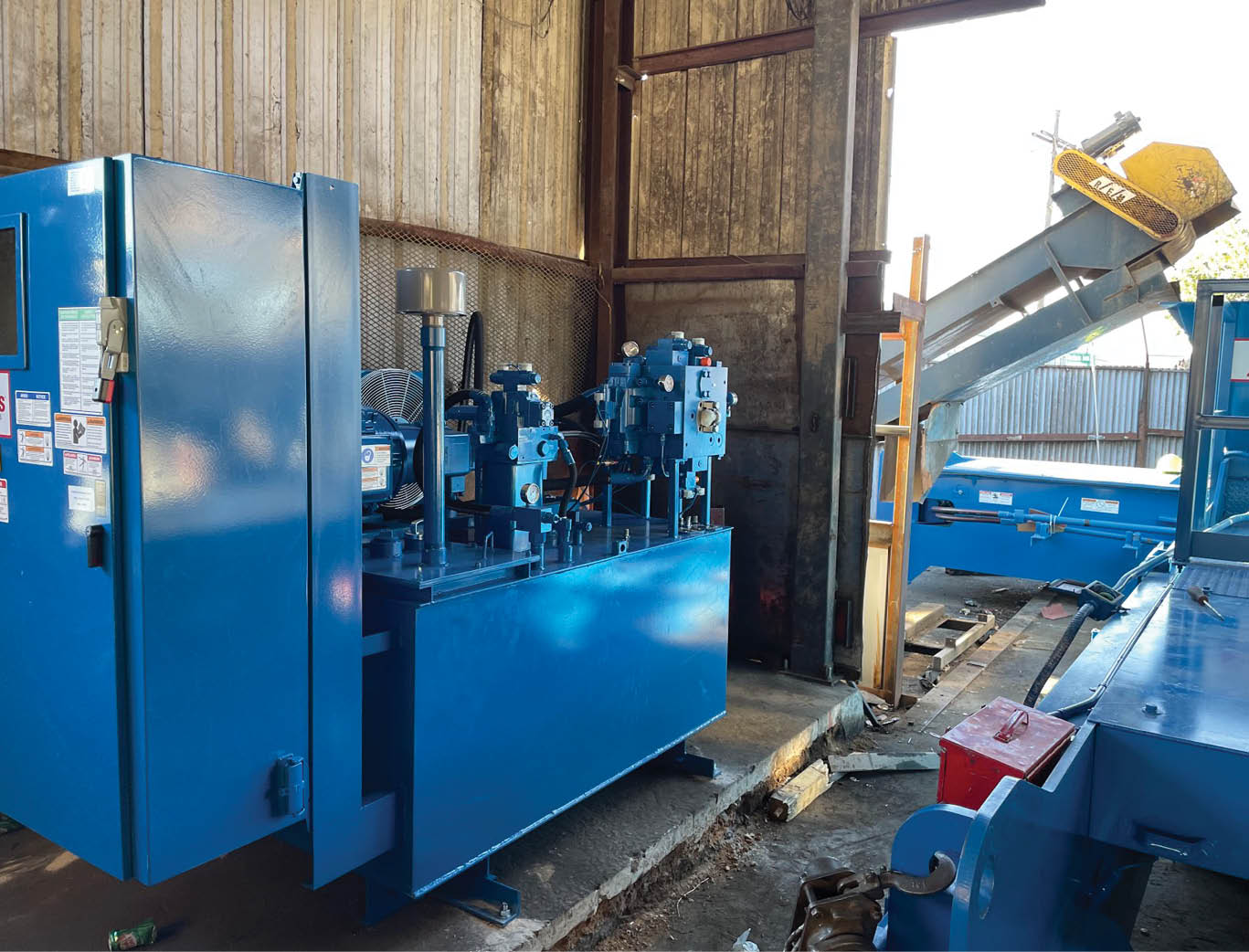 Installation of a new Harris Badger two-ram baler